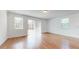 Bright and spacious living room with hardwood floors and sliding glass doors at 14315 Swanley St, Orlando, FL 32832