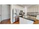 Modern kitchen features stainless steel appliances and granite countertops at 14315 Swanley St, Orlando, FL 32832