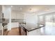 Island kitchen with granite countertops and stainless steel appliances at 14315 Swanley St, Orlando, FL 32832