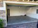Attached garage with concrete floor and extra storage space at 14315 Swanley St, Orlando, FL 32832