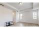 Bright bedroom featuring wood-look flooring and neutral walls at 14315 Swanley St, Orlando, FL 32832