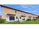 Townhouse exterior with landscaped yard and rear view at 14315 Swanley St, Orlando, FL 32832