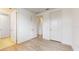 Spacious bedroom with wood-look floors and access to multiple rooms at 14315 Swanley St, Orlando, FL 32832