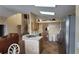 Kitchen with an island, stainless steel appliances, and wood cabinets at 3011 Bransbury Ct, Kissimmee, FL 34747