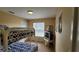 Cozy bedroom with bunk beds and window at 3011 Bransbury Ct, Kissimmee, FL 34747