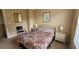Bright bedroom with a queen-size bed and nightstands at 3011 Bransbury Ct, Kissimmee, FL 34747