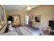 Bright bedroom with a queen-size bed and access to a bathroom at 3011 Bransbury Ct, Kissimmee, FL 34747