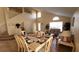 Elegant dining area next to living room with a view of the stairs at 3011 Bransbury Ct, Kissimmee, FL 34747