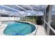 Screened-in pool with lake view at 3011 Bransbury Ct, Kissimmee, FL 34747