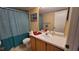Clean bathroom with tub shower, sink and vanity at 3011 Bransbury Ct, Kissimmee, FL 34747