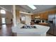 Kitchen with an island and stainless steel appliances at 3011 Bransbury Ct, Kissimmee, FL 34747