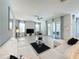 Open living room with access to a patio and plenty of natural light at 416 Orange Cosmos Blvd, Davenport, FL 33837