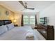 Large main bedroom with king-size bed and TV at 416 Orange Cosmos Blvd, Davenport, FL 33837
