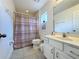Clean bathroom with shower, toilet, and vanity at 416 Orange Cosmos Blvd, Davenport, FL 33837