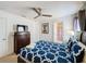 Bedroom with double bed, ensuite bathroom and ceiling fan at 416 Orange Cosmos Blvd, Davenport, FL 33837