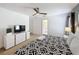 Bright bedroom with a king-size bed and ensuite bathroom at 416 Orange Cosmos Blvd, Davenport, FL 33837