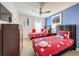 Bedroom with two twin beds and beach themed decor at 416 Orange Cosmos Blvd, Davenport, FL 33837