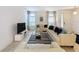 Spacious living area with comfortable seating and large windows at 416 Orange Cosmos Blvd, Davenport, FL 33837