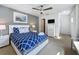 Bright bedroom with a queen bed and en-suite bathroom at 416 Orange Cosmos Blvd, Davenport, FL 33837