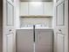 Laundry room with washer and dryer in a closet at 416 Orange Cosmos Blvd, Davenport, FL 33837