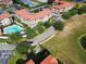 Aerial view showcasing community pool and building exteriors at 907 Charo Pkwy # 933, Davenport, FL 33897