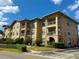 Two-story building with multiple apartments at 907 Charo Pkwy # 933, Davenport, FL 33897
