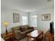 Comfortable sitting area with a sofa and coffee table at 256 Sevilla Ave, Davenport, FL 33897
