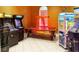 Fun game room with air hockey and arcade games at 256 Sevilla Ave, Davenport, FL 33897