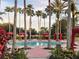 Relaxing pool area with cabanas and lush landscaping at 256 Sevilla Ave, Davenport, FL 33897