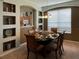 Dining room with a glass-top table and six chairs at 256 Sevilla Ave, Davenport, FL 33897