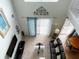 Overhead view of living room with dark brown leather couches at 256 Sevilla Ave, Davenport, FL 33897