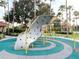 Modern playground structure with climbing wall and slide at 256 Sevilla Ave, Davenport, FL 33897