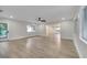 Living room with hardwood floors and an open floor plan at 715 Eastover Cir, Deland, FL 32724