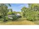 Ranch home with mature trees and a spacious yard at 715 Eastover Cir, Deland, FL 32724