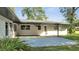 Covered patio, perfect for outdoor relaxing and entertaining at 715 Eastover Cir, Deland, FL 32724