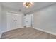 Bedroom with double doors leading to closet and bathroom at 715 Eastover Cir, Deland, FL 32724