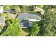 Aerial view showcasing the house and surrounding landscape at 715 Eastover Cir, Deland, FL 32724