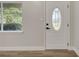 Interior entryway with wood floors and a glass door at 715 Eastover Cir, Deland, FL 32724