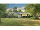Ranch home with a large yard at 715 Eastover Cir, Deland, FL 32724