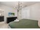Comfortable bedroom with a queen bed, TV, and plenty of closet space at 3525 Lavender Dr, Davenport, FL 33897