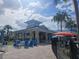 Open-air community gazebo with blue chairs at 3525 Lavender Dr, Davenport, FL 33897
