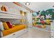bedroom with a bunk bed and Mickey Mouse wall mural at 3525 Lavender Dr, Davenport, FL 33897