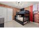 bedroom with a bunk bed and Spiderman wall mural at 3525 Lavender Dr, Davenport, FL 33897