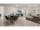Modern dining area with a sleek table and chairs, perfect for Gathering meals at 3525 Lavender Dr, Davenport, FL 33897