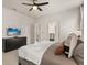 Spacious bedroom with a king-size bed and en-suite bathroom access at 3525 Lavender Dr, Davenport, FL 33897