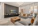 Spacious living room with gray sectional sofa and modern decor at 3525 Lavender Dr, Davenport, FL 33897