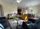 Spacious living room with ample natural light and a relaxing atmosphere at 10791 Gran Paradiso Dr # S, Orlando, FL 32832
