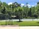 Community tennis court with bike rack nearby at 10791 Gran Paradiso Dr # S, Orlando, FL 32832
