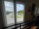 Peaceful view of a canal and lush greenery from private balcony at 10791 Gran Paradiso Dr # S, Orlando, FL 32832