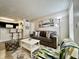 Cozy living room featuring a comfortable sofa and coffee table at 2210 Grand Cayman Ct # 1722, Kissimmee, FL 34741
